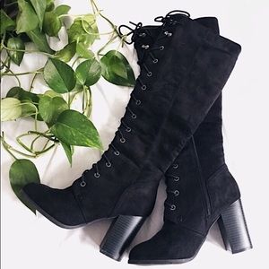 Knee high lace up boots